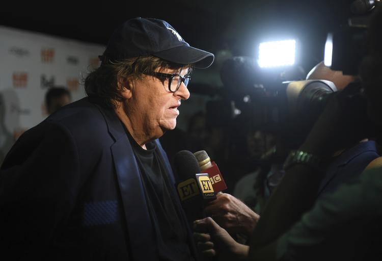 Michael Moore ses her ved premieren på 'Fahrenheit 11/9' i Toronto.  Arthur Mola/AP