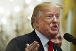 Den amerikanske præsident, Donald Trump, er angiveligt fast besluttet på at optrappe handelskrigen med Kina. Jacquelyn Martin/AP