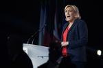 Den franske partileder for Rassemblement National, der tidligere var kendt som Front National, Marine Le Pen, på talerstolen i Nice, maj, 2018.  Thibault Camus/AP