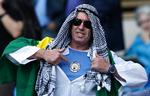Manchester City er en af de klubber, som er blevet løftet til et helt nyt niveau økonomisk og sportsligt, efter nye udenlandske ejere er kommet til. Langt de fleste lokale fans har taget godt imod ændringerne. (AP Photo/Jon Super) Jon Super/AP