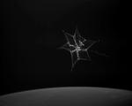 Skraldesatellitten er cirka 100 kilo tung og på størrelse med et køleskab. Den er ud over nettet bevæbnet med en harpun og et sejl. Her et foto fra en video af nettet fra skraldesatellitten.
(University of Surrey via AP)
   /AP