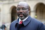 Præsident George Weah har et problem. Eller mindst 600 millioner af slagsen, mener nogle efter afsløringen af, at en containerfuld pengesedler kunne blive væk.. Francois Mori/AP
