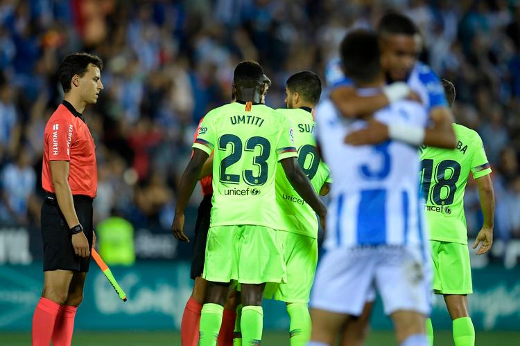 Leganes-spillerne i jubel efter scoring og sejr mod Barcelona. Oscar del Pozo/Ritzau Scanpix