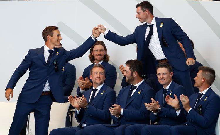 Thorbjørn Olesen og Rory McIlroy lovede torsdag aften hinanden en stærk indsats ved Ryder Cup, hvor de sammen udfordrer USA. Alastair Grant/AP