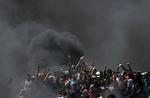 Da USA i maj flyttede sin ambassade fra Tel Aviv til Jerusalem , blev det mødt med demonstrationer og uroligheder mange steder i verden, ikke mindst i Gaza-striben, hvor 58 mennesker mistede livet. Khalil Hamra/AP