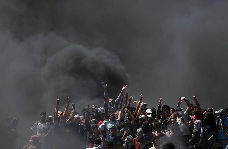 Da USA i maj flyttede sin ambassade fra Tel Aviv til Jerusalem , blev det mødt med demonstrationer og uroligheder mange steder i verden, ikke mindst i Gaza-striben, hvor 58 mennesker mistede livet. Khalil Hamra/AP