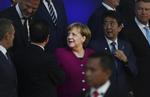 »Topmødet viser, at landene i Europa og Asien, som alle ønsker et regelbaseret handelssystem, samles for at bekræfte støtten til internationalt samarbejde. Det er et vigtigt signal, siger den tyske forbundskansler, Angela Merkel. (AP Photo/Francisco Seco)
   Francisco Seco/AP