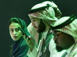 
    Saudiske mebedsmænd printer badges til deltagerne i det store prestigefyldte økonomiske topmøde - man afbuddene fra hele verden strømmer ind.  Amr Nabil/AP