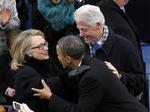 Hillary og Bill Clinton sammen med Barack Obama.  Susan Walsh/AP