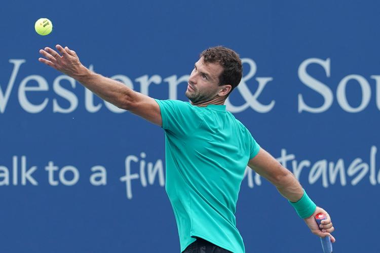 Grigor Dimitrov, der her ses på vej til sin første (og eneste) Masters 1000-titel i Cincinnati sidste år, kæmper i denne sæson med at finde form. John Minchillo/AP