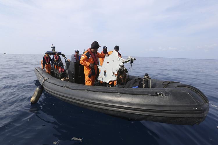 Achmad Ibrahim/AP