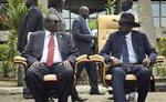 Riek Machar til venstre tilbage i 2016.Præsident Salva Kiir til højre. Jason Patinkin/AP