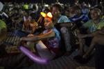 En stor karavane af migranter bevæger sig op gennem Mexico i retning mod USA. Rodrigo Abd/AP