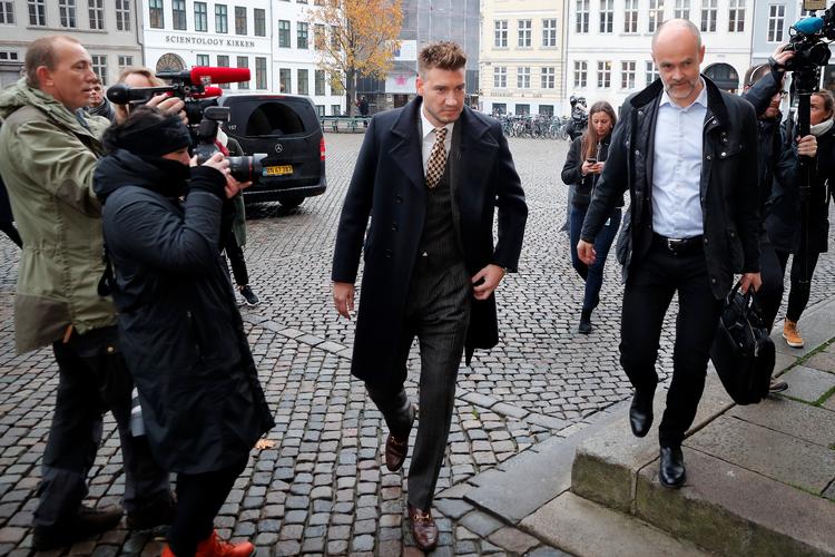 Nicklas Bendtner ankommer til byretten i selskab med sin advokat, Anders Németh. Jens Dresling/POLFOTO