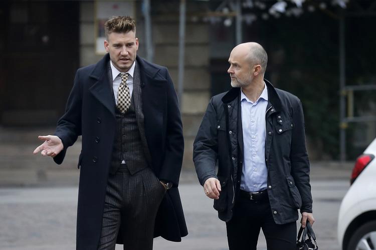 Fodboldspilleren Nicklas Bendtner på vej i Københavns Byret med sin advokat Anders Németh. Jens Dresling/POLFOTO