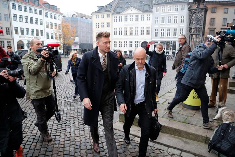 Fodboldspilleren Nicklas Bendtner på vej i Københavns Byret med sin advokat Anders Németh. Jens Dresling/POLFOTO