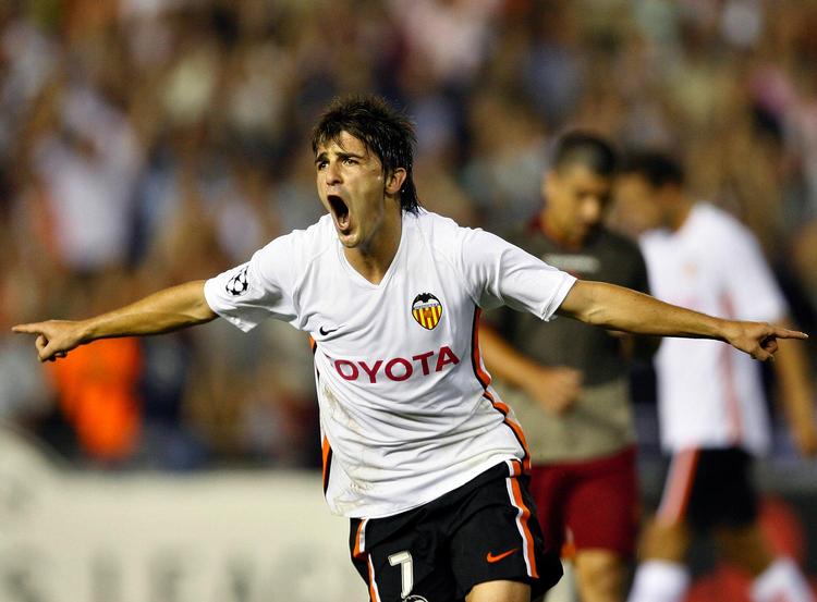 David Villa var fra 2005-2010 en af de store spillere for Valencia, men da klubben manglede penge, blev han solgt til Barcelona. Jasper Juinen/AP