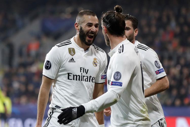 Real-angriber Karim Benzema scorede to gange, da hans hold onsdag aften vandt 5-0 ude over Viktoria Plzen. Petr David Josek/AP