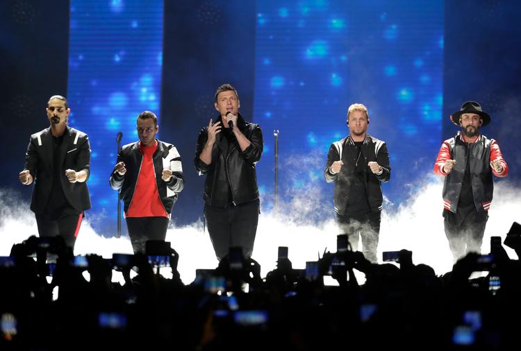 Besøget i Danmark er en del af deres ’DNA World Tour’, som begynder 11. maj i Portugal. Mark Humphrey/AP