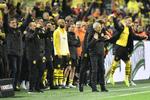 Det var Dortmund, der i sidste ende havde grund til at juble i topopgøret mod Bayern München, som de vandt 3-2. Undervejs havde de to gange været bagud. Martin Meissner/AP