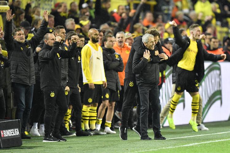 Det var Dortmund, der i sidste ende havde grund til at juble i topopgøret mod Bayern München, som de vandt 3-2. Undervejs havde de to gange været bagud. Martin Meissner/AP