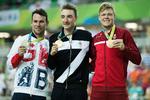 Landevejsstjernen Elia Viviani noteredes for sit fornemste resultat på banen, da han i Rio erobrede OL-guld i omnium foran Mark Cavendish (t.v.) og Lasse Normnan. Gregers Tycho/POLFOTO