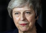 Premierminister Theresa May fylder forsiderne på de britiske aviser i dag. Matt Dunham/AP