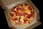 En stribe Domino's-restauranter har skiftet CVR-nummer, og det betyder, at de selv kan vælge, om de vil vise gamle smileyrapporter til kunderne. Jakob Jørgensen/POLFOTO