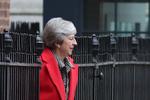 Theresa May er på vej ind i endnu en lang Brexit-uge. 

 Foto: Daniel Leal-olivas/Ritzau Scanpix