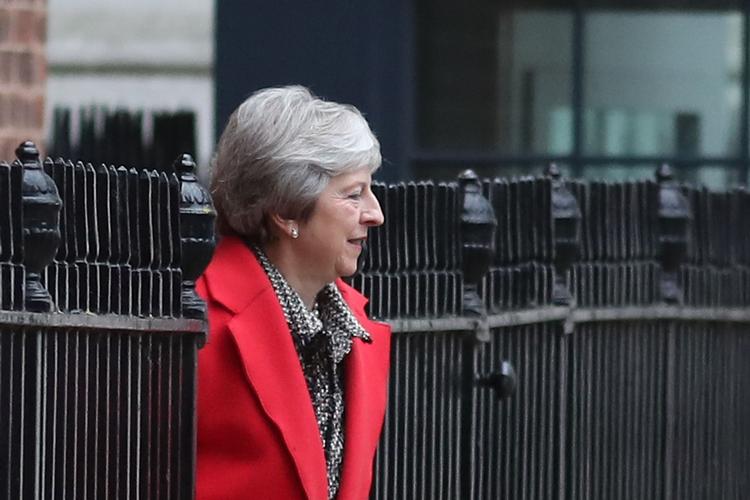 Theresa May er på vej ind i endnu en lang Brexit-uge. 

 Foto: Daniel Leal-olivas/Ritzau Scanpix
