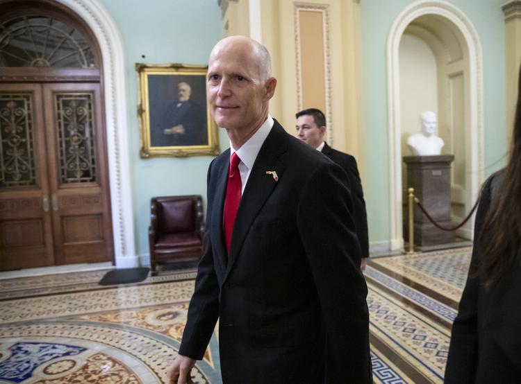 Rick Scott har fået 10.033 stemmer mere end sin modkandidat, demokraten Bill Nelson. J. Scott Applewhite/AP