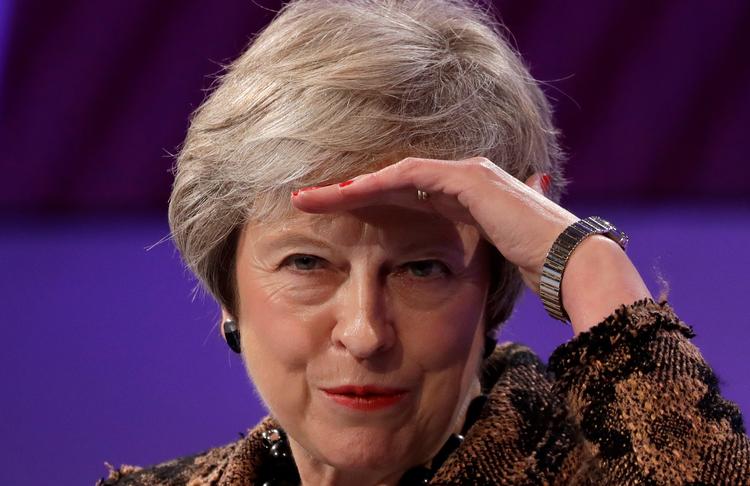 Theresa May har nået til foreløbig enighed med EU, nu spejder hun efter et flertal i sit eget parlament. Foto: Kirsty Wigglesworth/AP