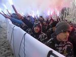 Medlemmer af en højreorienteret paramilitær gruppe, Azovs Nationalkorps, demonstrerer i dag i Kijev. Gruppen ønsker en hård kurs over for Rusland. Foto: Efrem Lukatsky/AP