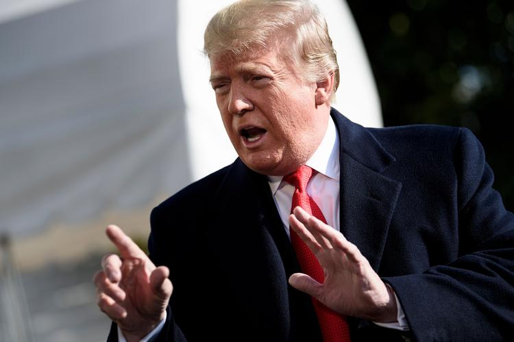 Donald Trump beskyldte Michael Cohen for at lyve, inden han drog afsted mod G20-topmødet i Argentina.  Foto: Brendan Smialowski/Ritzau Scanpix