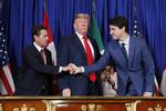 USA's præsident Trump underskrev i dag en ny handelsaftale med sine kollegaer fra henholdsvis Mexico og Canada, Enrique Peña Neto og Justin Trudeau. Foto: Pablo Martinez Monsivais/Ritzau Scanpix