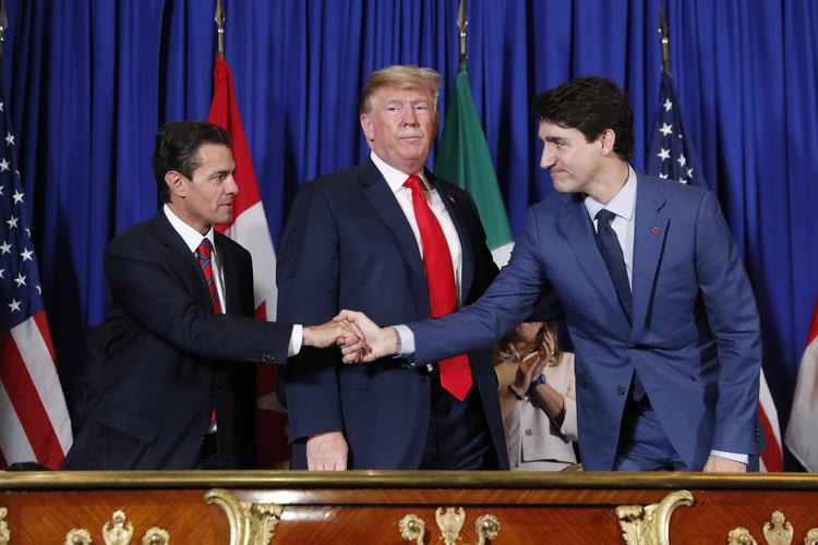 USA's præsident Trump underskrev i dag en ny handelsaftale med sine kollegaer fra henholdsvis Mexico og Canada, Enrique Peña Neto og Justin Trudeau. Foto: Pablo Martinez Monsivais/Ritzau Scanpix