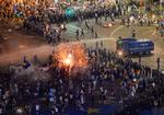 I august gik rumænerne, især mange eksil-rumænere, på gaden og protesterede mod regeringen og korruptionen.  Foto: Andreea Alexandru/AP