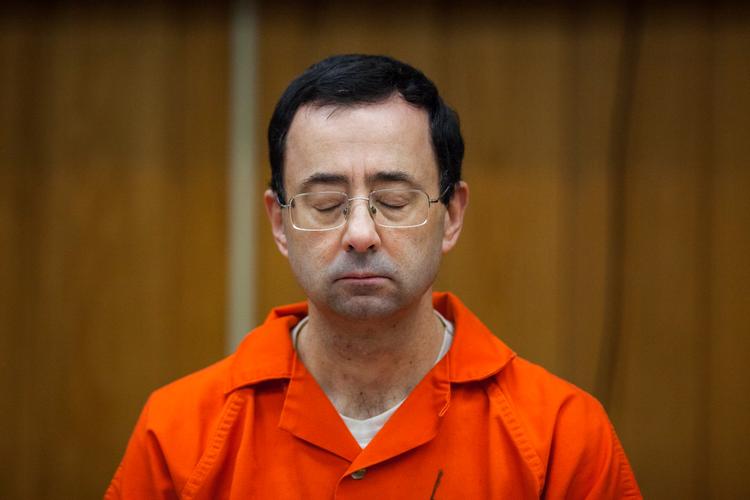 55-årige Larry Nassar har erkendt sine mange forbrydelser, og den tidligere læge er blevet idømt sammenlagt flere hundrede års fængsel.
   Foto: Cory Morse/AP