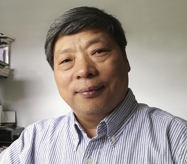 Lu Guang er en af Kinas mest kendte fotografer. Dette billede er taget få uger før hans forsvinden. Foto: Xu Xiaoli/AP