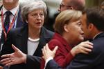 Stol på mig, lød det fra May i Bruxelles. Foto: Alastair Grant/AP