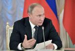 Putin under pressemødet, hvor han gjorde opmærksom på, at den populære rapmusik i Rusland i præsidentens øjne børn kontrolleres mere.  Foto: Alexei Nikolsky/AP