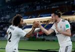 Gareth Bale fejrer en af sine tre scoringer med holdkammeraten Marcelo. Foto: Hassan Ammar/AP