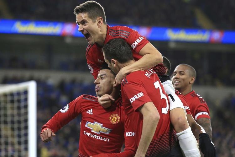 Manchester Uniteds Jesse Lingard fejrer sit mål med sine holdkammerater.  Foto: Jon Super/AP