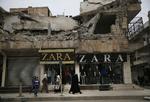 For første gang i seks år indtager Syriens hær Manbij, en strategisk vigtig by i den nordlige del af landet.  Foto: Hussein Malla/AP