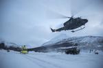 
   En helikopter leder efter de savnede. Foto: Bendiksby, Terje/Ritzau Scanpix