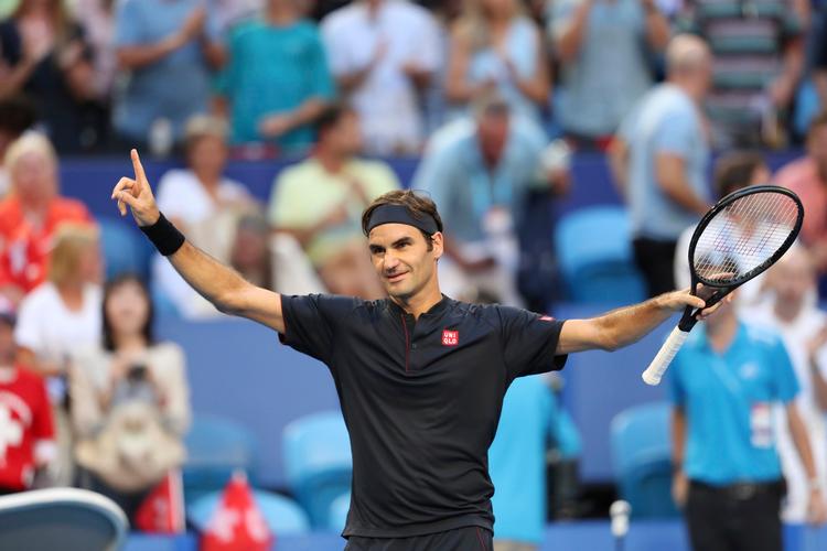 Roger Federer har hele ugen vist fremragende tennis under Hopman Cup, og han bliver igen værd at holde øje med under det kommende Australian Open. Hans makker i Perth, Belinda Bencic, er også tæt på tidligere topniveau.
   Foto: Trevor Collens/AP