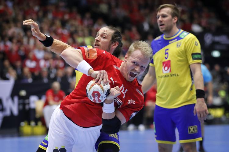 Danmarks  Anders Zachariassen scorer.
   Foto: Jens Dresling/POLFOTO