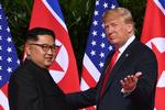 Trump og Kim Jong-un mødtes første gang i juni 2018 i Singapore. Foto: Saul Loeb/Ritzau Scanpix