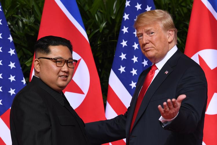 Trump og Kim Jong-un mødtes første gang i juni 2018 i Singapore. Foto: Saul Loeb/Ritzau Scanpix