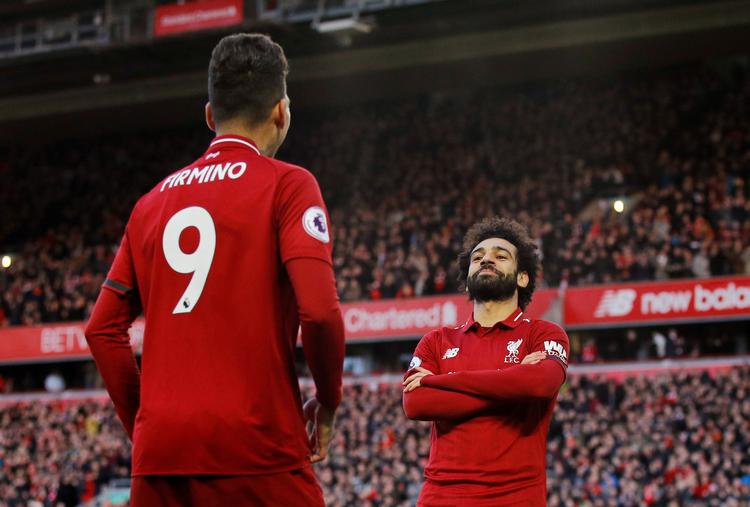 Mohammed Salah slukkede alt håb for Bournemouth med sin scoring til 3-0. Roberto Firmino assisterede flot målet med en hælaflevering.  Foto: Phil Noble/Ritzau Scanpix